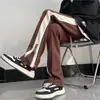 Pantalones Casuales Retro Estilo Americano con Raya Lateral para Hombre High Street Cremallera Dividida Pantalones de Chándal Rectos Micro Largos