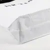 Bolso Tejido Blanco Simple de Moda Personalizado Bolso de Mano de Tienda de Ropa de Marca de Diseñador Bolsa de Almacenamiento Biselada