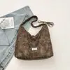 Bolsa Tote Estampa de Leopardo Feminina 2026 Nova Outono Leve Luxo Toque de Alto Padrão Bolsa de Ombro Único Grande Capacidade Bolsa Saco Transversal