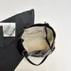 Bolsa de axila de mano estilo japonés 2025 Bolso tote para mujer Bolso para mujer Bolso de hombro de gran capacidad Estilo casual Normcore