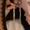 Material de cobre con baño de oro real, pendientes largos con borla de pedrería brillante, elegantes y modernos, hacen que el rostro parezca más delgado, pendientes de mujer a la moda y versátiles