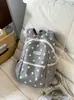 Mochila ligera para la escuela y los viajes, mochila elegante para estudiantes, mochila linda de lunares, mochila casual y versátil para estudiantes