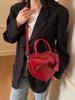 Bolso de mano rojo de Corea del Sur para mujer 2025 nueva moda dulce lazo melocotón corazón bolso bandolera versátil