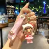 Lindo llavero de Sanrio con colgante de muñeco de dibujos animados para coche, accesorios para bolso, adornos colgantes, pequeño regalo al por mayor
