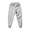 Pantalones de chándal de alta calidad, forrados de forro polar y engrosados para otoño e invierno, con un diseño moderno, adecuados para deportes y uso casual, y que proporcionan calidez. Nuevo estilo para hombre con puños elásticos