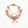 Pulsera estilo Panjia para mujer网红 ins nicho lujo ligero oro 14K colgante atrapasueños pulsera de cuentas de vidrio pulsera marea