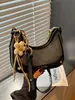 Bolsas de Mujer Transfronterizas 2026 Bolso de Mano de Nicho para el Trabajo Bolso de Hombro Underarm Retro Bolso Cruzado Pequeño Cuadrado Casual de Alta Gama