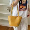 Bolsa tejida transfronteriza 2026 Nueva tendencia vintage de gran capacidad, de un solo hombro, para debajo del brazo, tipo cubo, bolso de mano moderno y simple