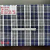 Tela de camisa de cuadros de primavera y verano 21 poliéster algodón teñido en hilo 135 gramos cuadrados tejido jacquard lunares