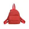Mochila xadrez de cor sólida para mulheres, novo estilo 2026, casual, leve, versátil, bolsa de viagem cor de vinho, mini mochila