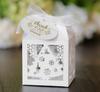 Caja de dulces hueca láser de comercio exterior, caja de dulces con cinta para árbol de Navidad, caja de regalo verde de copo de nieve navideño, venta al por mayor de fábrica