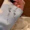 Pendientes Versátiles Estilo Coreano con Borla de Copo de Nieve para Mujer, Diseño Largo, Estilo de Nicho, Elegantes y Versátiles, Ambiente de Lujo Ligero, Pendientes Populares
