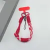 Estilo Ins pulseira de celular trançada em cores contrastantes, alça curta para pulso, chaveiro pingente anti-perda para câmera CCD, unissex
