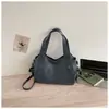 Bolso de hombro retro de gran capacidad transfronterizo para mujer, nuevo bolso tote de moda moderno para el día a día, bolso de mano y bolso cruzado versátil