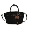 Bolso de mano único para mujer 2026 verano nuevo vintage de alto valor para el trabajo bandolera elegante bolso cubo cruzado