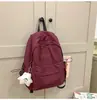 Mochila Exterior Simple de Color Sólido Diseño para Mujer Nicho Ligera Bolsa Escolar para Estudiantes de Primaria y Secundaria Mochila Pequeña