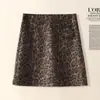 Falda midi retro con estampado de leopardo para mujer, nueva colección otoño/invierno 2026, de cintura alta, adelgazante, versátil, moderna, chic y adecuada para figuras petite.