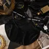 2026 Venta Caliente Sexy Tirante Delgado Hebilla Metálica Hueco Seda de Hielo Estampado de Leopardo Cintura Media Cinturilla con Letras Entrepierna de Algodón Puro Calzones para Mujer