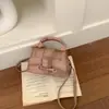 2026 Verão Nova Tendência de Moda Simples Casual Cor Sólida Elegante Bolsa de Mão Transversal Ombro Pequena Quadrada Feminina