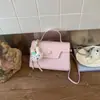 Bolsa Quadrada Pequena de Mão Retro Simples Feminina 2026 Nova Primavera Moda Casual Bolsa de Ombro Único Bolsa Transversal de Personalidade Ins