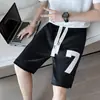Shorts brancos simples masculinos de verão finos marca de moda listrados vestuário externo calças esportivas curtas masculinas soltas calças de praia