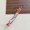 Cordão de Fita Tecida com Padrões Coloridos Pastorais, Alça de Pulso Chaveiro de Câmera, Anti-Perda, Cordão Elegante e Simples para Bolsa e Celular