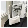 Bolsa de Axila Coreana de Nicho para Mulheres 2026 Novo Modelo Moda Retrô Quadrada Pequena para Comércio Exterior Bolsa de Mão Bolsa de Ombro