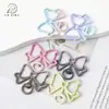 Pintura Galvanizada de Alta Calidad Colgante Degradado de Dos Tonos Corte Calado Lazo Hebilla de Resorte Accesorios de Joyería DIY Llavero Colgante para Bolsa