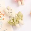 Primavera y verano nuevo broche de conejo felpa lindo animal pequeño caricatura japonés ropa de niñas zapatos colgante de bolso pequeño regalo