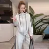 Conjunto deportivo casual hecho a medida para mujer, nueva colección de otoño, moderno y de corte holgado, efecto adelgazante, incluye sudadera con capucha y pantalones de pierna ancha, conjunto de dos piezas
