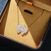 Suncloud temperamento simple diamante mariposa flor colgante chapado en oro dos colores cadena corta para clavícula collar mujeres
