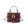 Bolsa de mão retrô versátil de cor sólida 2026 transfronteiriça, elegante e moderna com design único, bolsa de ombro fashion