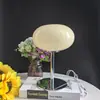 Lámpara de mesa de cristal de lujo ligero italiano para mesita de noche de dormitorio Lámpara de mesa decorativa de diseño simple para dormitorio principal Toque de alta gama Hierro