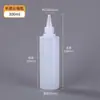 En stock 100ml Botella Puntiaguda Botella de Plástico PET Transparente Botella de Boca Pequeña Botella Puntiaguda Botella de Pigmento Pintado Botella Puntiaguda de Evitación
