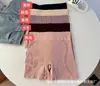 Conjunto de lencería femenina sin costuras con copas fijas, bralette push-up, tanga y sujetador reductor para busto grande con braguita plana al por mayor