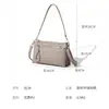 Bolso de Mano Simple Transfronterizo del Sudeste Asiático para Viajar al Trabajo, Bolso de Hombro con Múltiples Compartimentos, Bolso de Mano y Bolso Cruzado de Mujer con Cremallera de Color Sólido