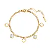 Pulsera popular de diseño de nicho transfronteriza, pulsera de flor de concha, trébol de cuatro hojas hueco de acero inoxidable 304