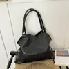 Bolsa tote de gran capacidad, bolso de hombro casual moderno para llevar bajo el brazo, diseño de nicho único y elegante, bolso de mano personalizado y de moda