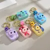 Cámara de simulación de proyección de dibujos animados llavero de moda colgante para bolso de niña pequeña juguete pequeño cuerda para la mano venta al por mayor