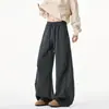 Pantalones casuales de primavera y otoño con diseño curvo, estilo retro americano deconstruido, pantalones deportivos holgados de pierna ancha recta para hombre con pliegues