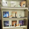 XiuLiKe expositor acrílico para cosméticos stand de estudio vitrina para productos de cuidado de la piel expositor
