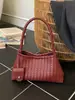 Bolso de mano tejido de nicho coreano para mujer, moda retro casual de moda nuevo otoño 2026, bolso de hombro bajo el brazo