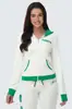 Traje de Terciopelo Millennial para Mujer: Conjunto de dos piezas con sudadera con capucha con cremallera y estampado de letras en bloques de color y pantalones largos acampanados