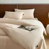 Nuevo juego de cuatro piezas de algodón 100% de color liso, alta densidad de hilos, algodón de fibra larga, engrosado y cepillado, funda de edredón simple para otoño e invierno, colcha y sábana bajera al por mayor