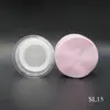 El fabricante suministra caja redonda morada para polvos sueltos 16g material de embalaje de polvo fijador plástico contenedor cosmético