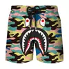 Pantalones cortos de verano transfronterizos nuevos con estampado digital 3D de cabeza de tiburón, para pareja, hombres y mujeres, marca de moda japonesa, pantalones de playa