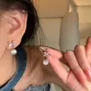 Brincos de Zircônia Pérola com Laço Estilo Luxo Leve para Mulheres Design de Nicho Brincos Versáteis Brincos de Temperamento de Celebridade da Internet Atacado
