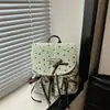 Bolso mini moderno y lindo para niñas, nueva colección primavera 2026, mochila de estilo dulce con lazo y cuadros