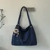 Bolsa Tote de Grande Capacidade Bolsa Feminina Nova Tendência Outono e Inverno 2025 Bolsa Transversal Simples e Estilosa Bolsa de Ombro Fashion para o Dia a Dia