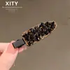 Estilo de lujo ligero exquisito clip para el pelo con incrustaciones de diamantes de imitación sensación de alta gama mechones de flequillo clip lateral para el pelo clip para el pelo sin marcas moda de celebridad de internet accesorios para el pelo